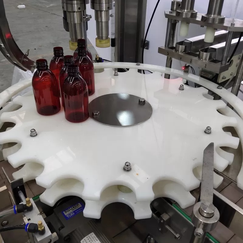 Máquina de llenado de botellas de aceite de control PLC de Siemens